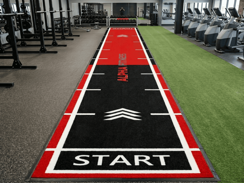 cleaning gym turf to remove rope lint and debris